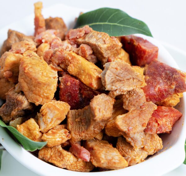 Carne de porco frita met aardappelpuree